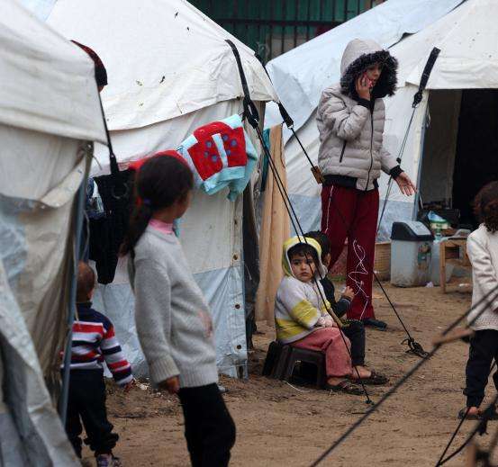 Displaced Palestinians in a tent camp in Rafah, Gaza.