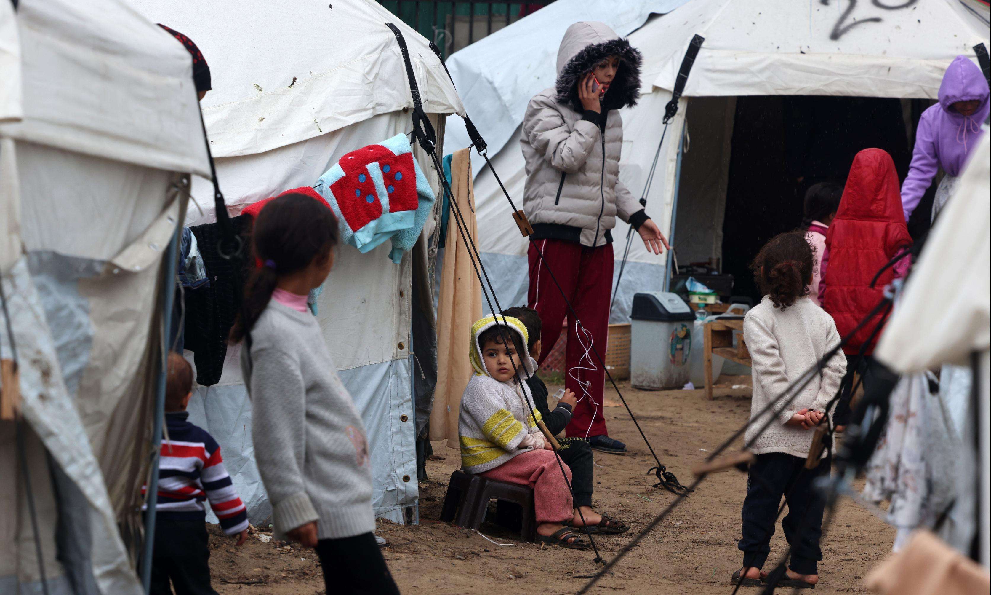 Displaced Palestinians in a tent camp in Rafah, Gaza.