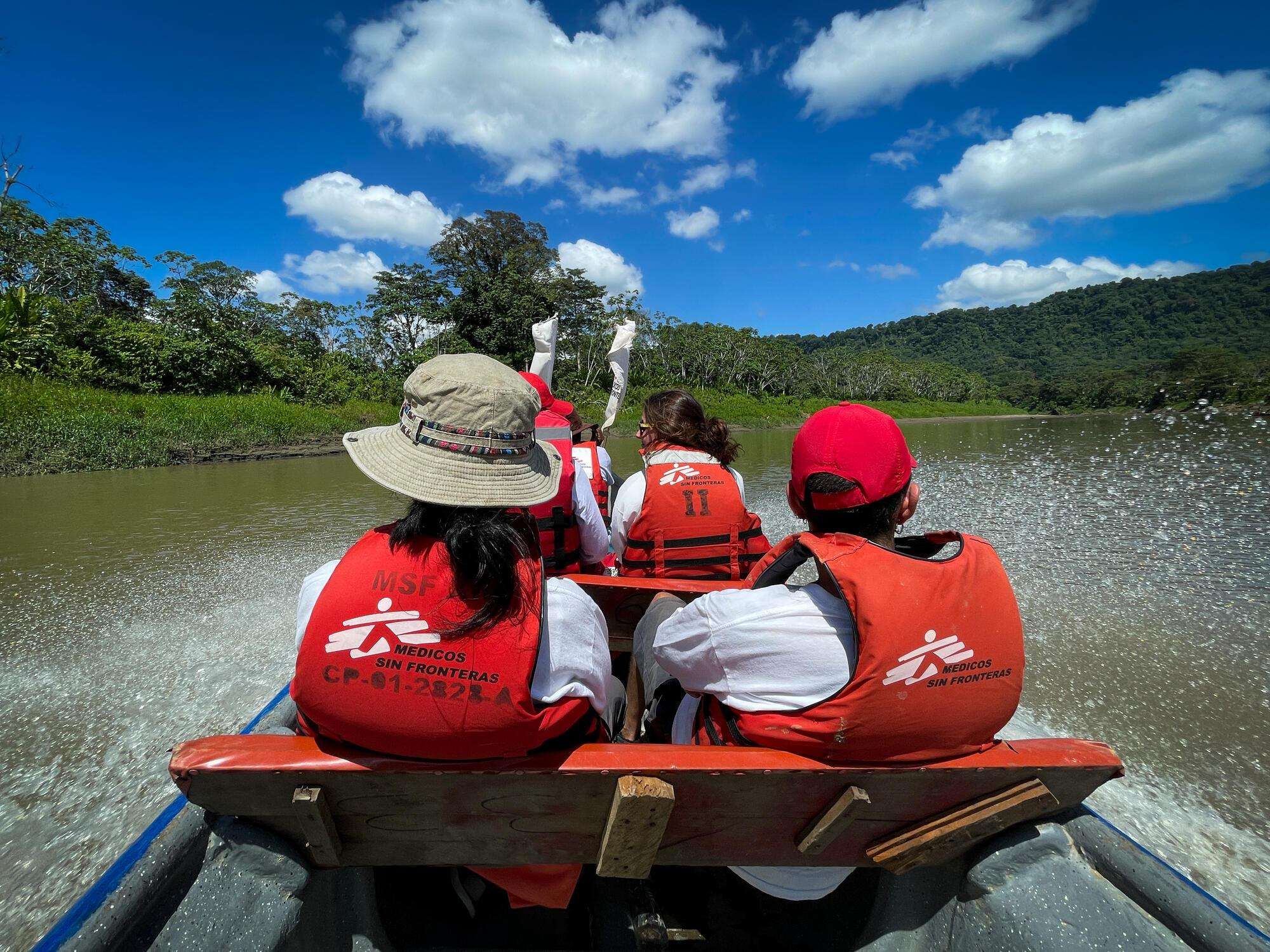 MSF staff members visiting a community by boat in Colombia.