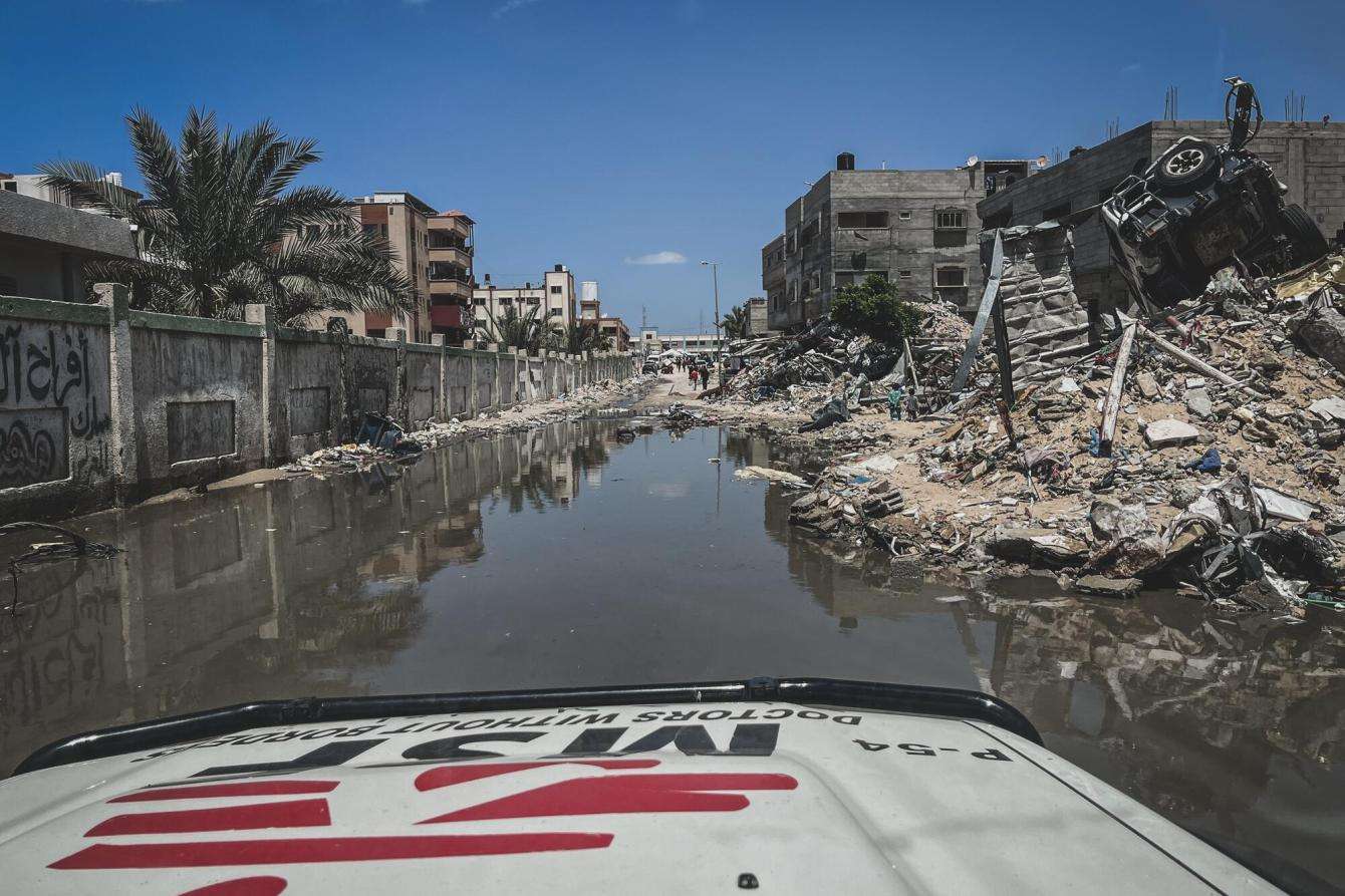 Flooded streets and wreckage in Gaza.