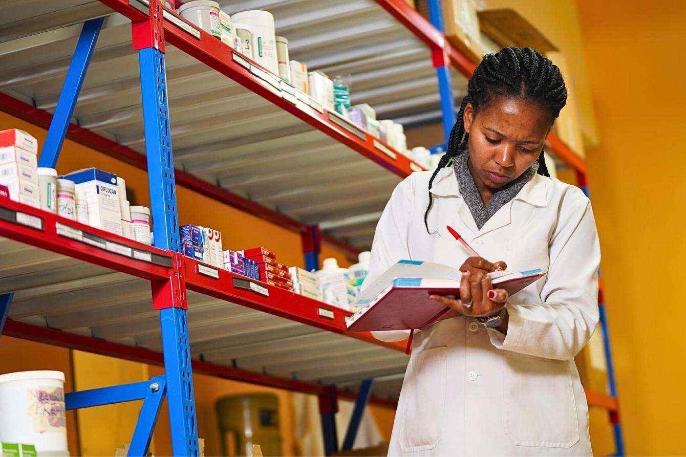 Dr. Elizabeth Muritu takes stock of medicines at the Karuri medically assisted therapy clinic in Kiambu, Kenya.