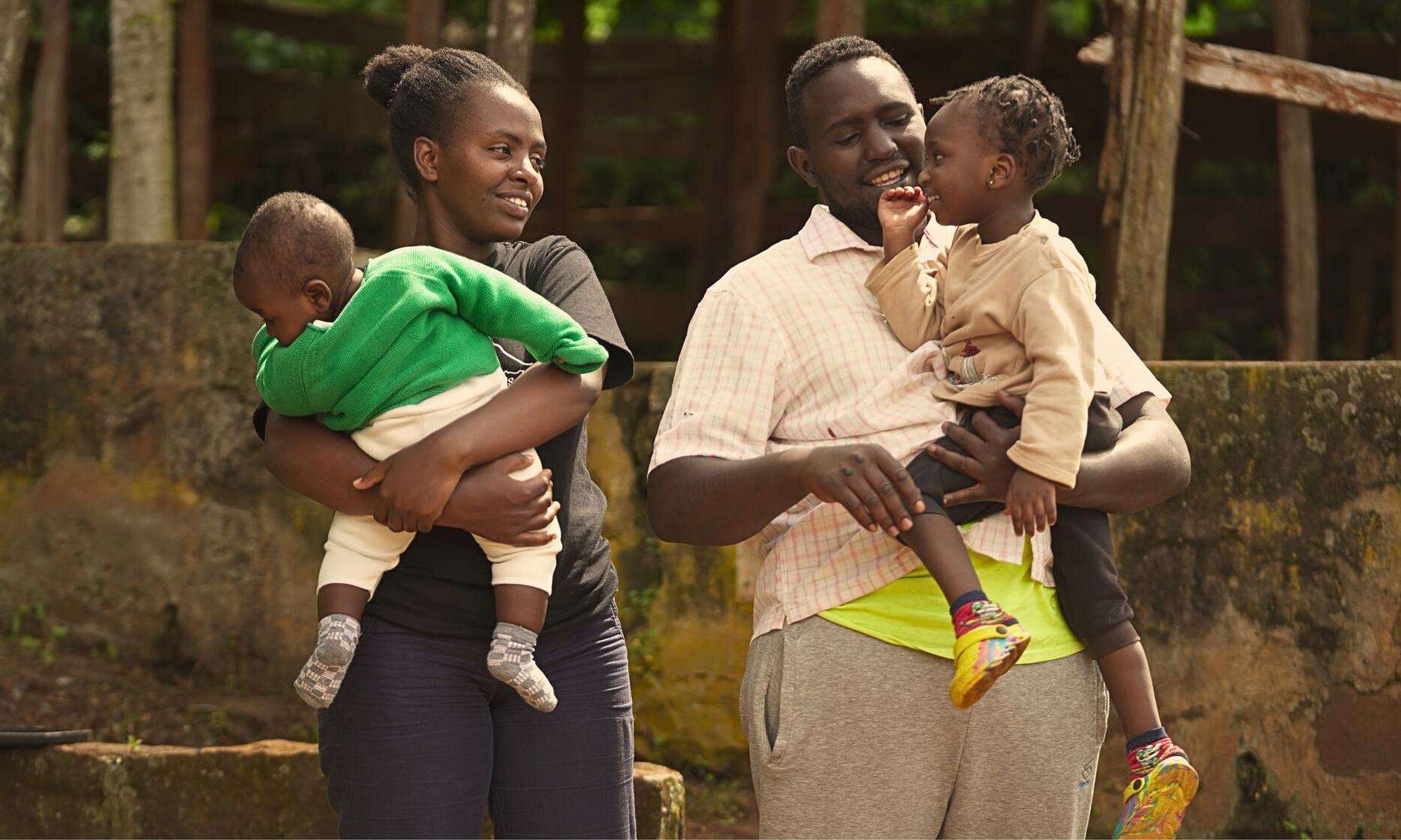 Michael Karongo with his wife Mary Wairimu—his greatest supporter in his recovery journey—and their children in Kenya.