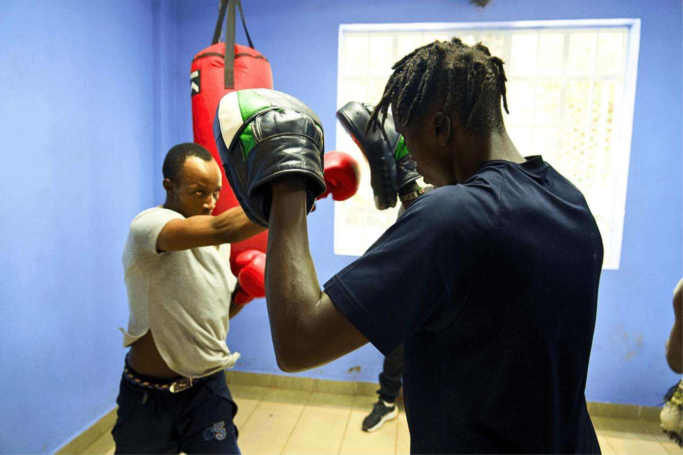 Patients learn boxing at the Karuri medically assisted therapy clinic empowerment center, Kenya.