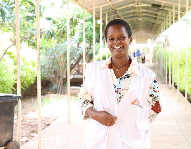 Health promotion officer Teka in front of Abiy Adi Hospital in Ethiopia. 