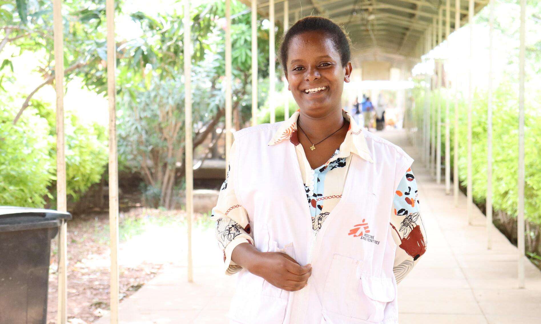 Health promotion officer Teka in front of Abiy Adi Hospital in Ethiopia. 