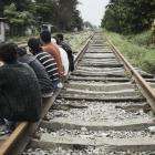 Migrants stop to rest in Coatzacoalcos, a port city in the state of Veracruz. 