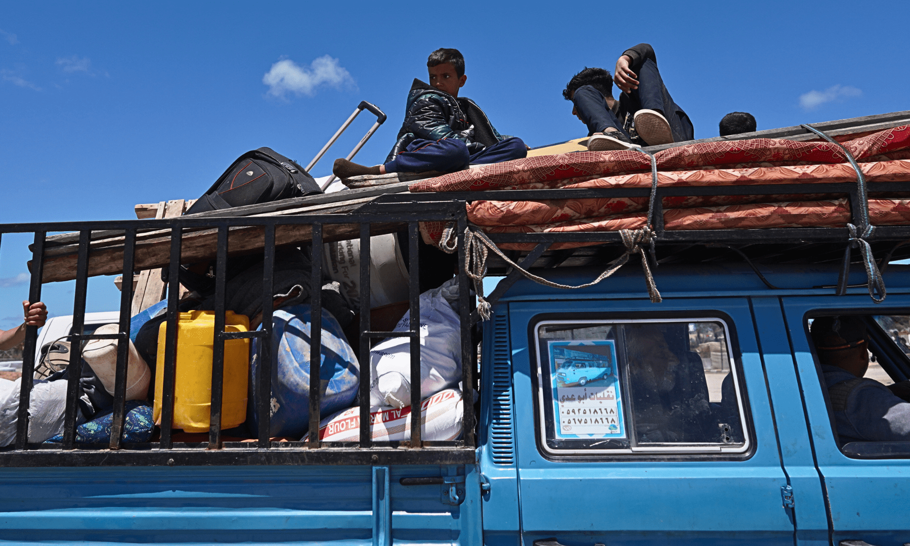 Displaced Palestinians fleeing Israeli military offensive in Rafah in May.